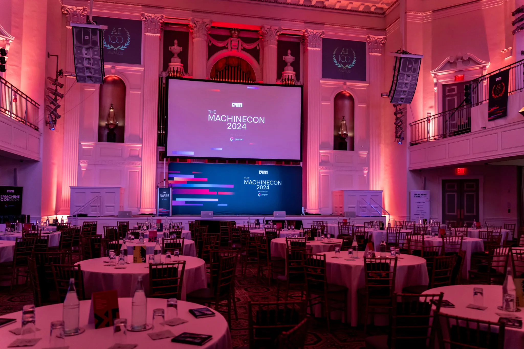 Event hall with round tables at MachineCon New York 2024