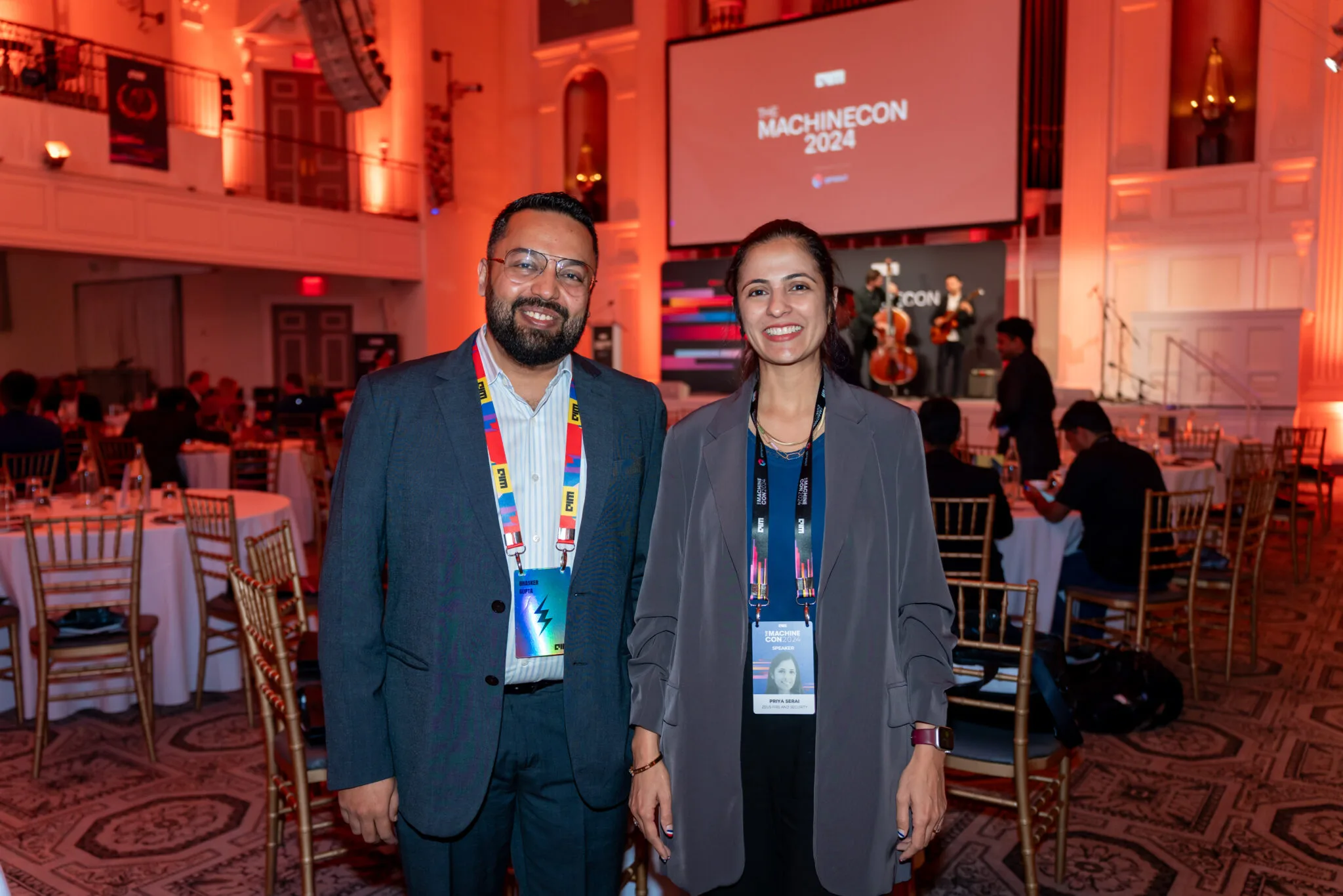 Attendees posing in the venue at MachineCon New York 2024