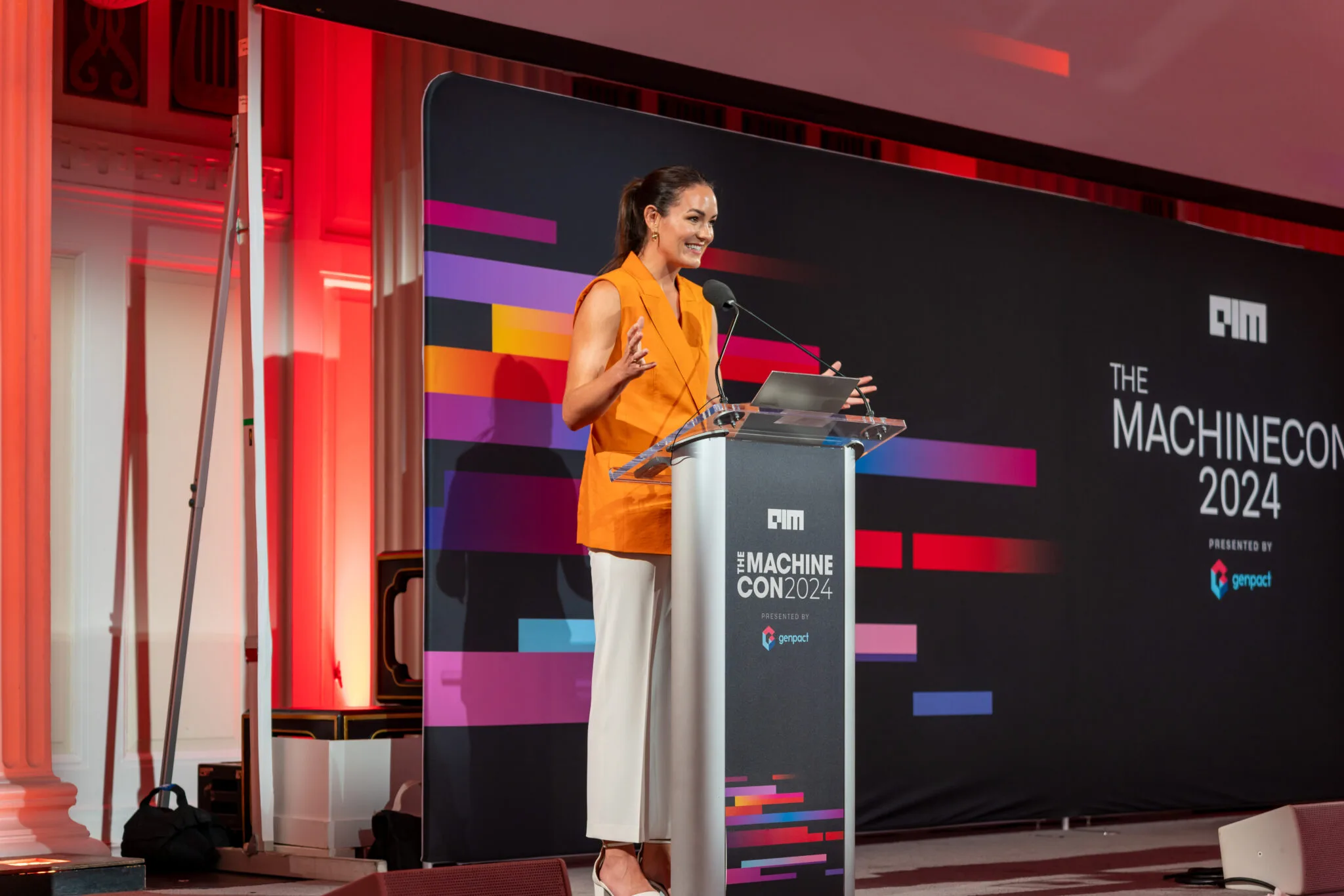 Speaker presenting on main stage at MachineCon New York 2024