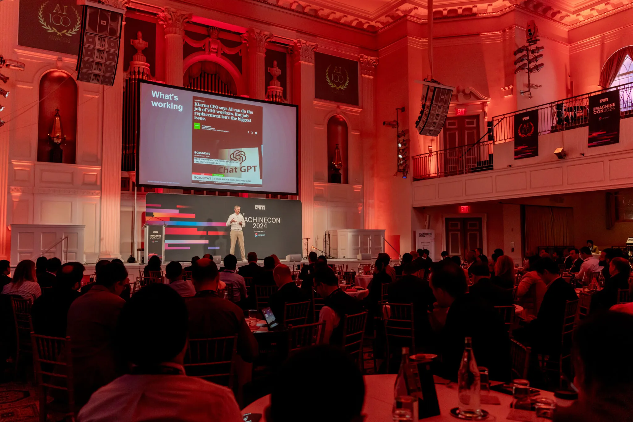 Speaker presenting on main stage at MachineCon New York 2024