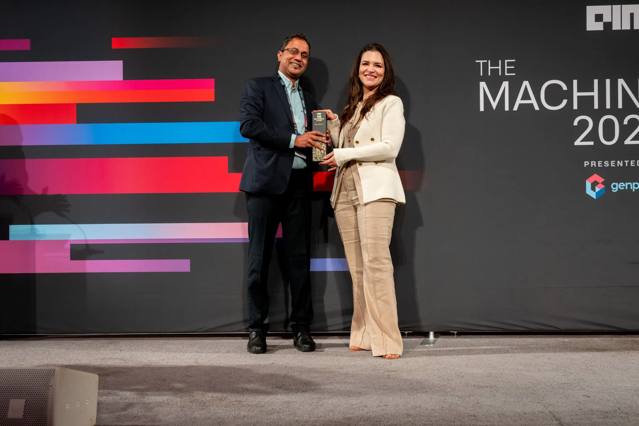 Award presentation on stage at MachineCon New York 2024