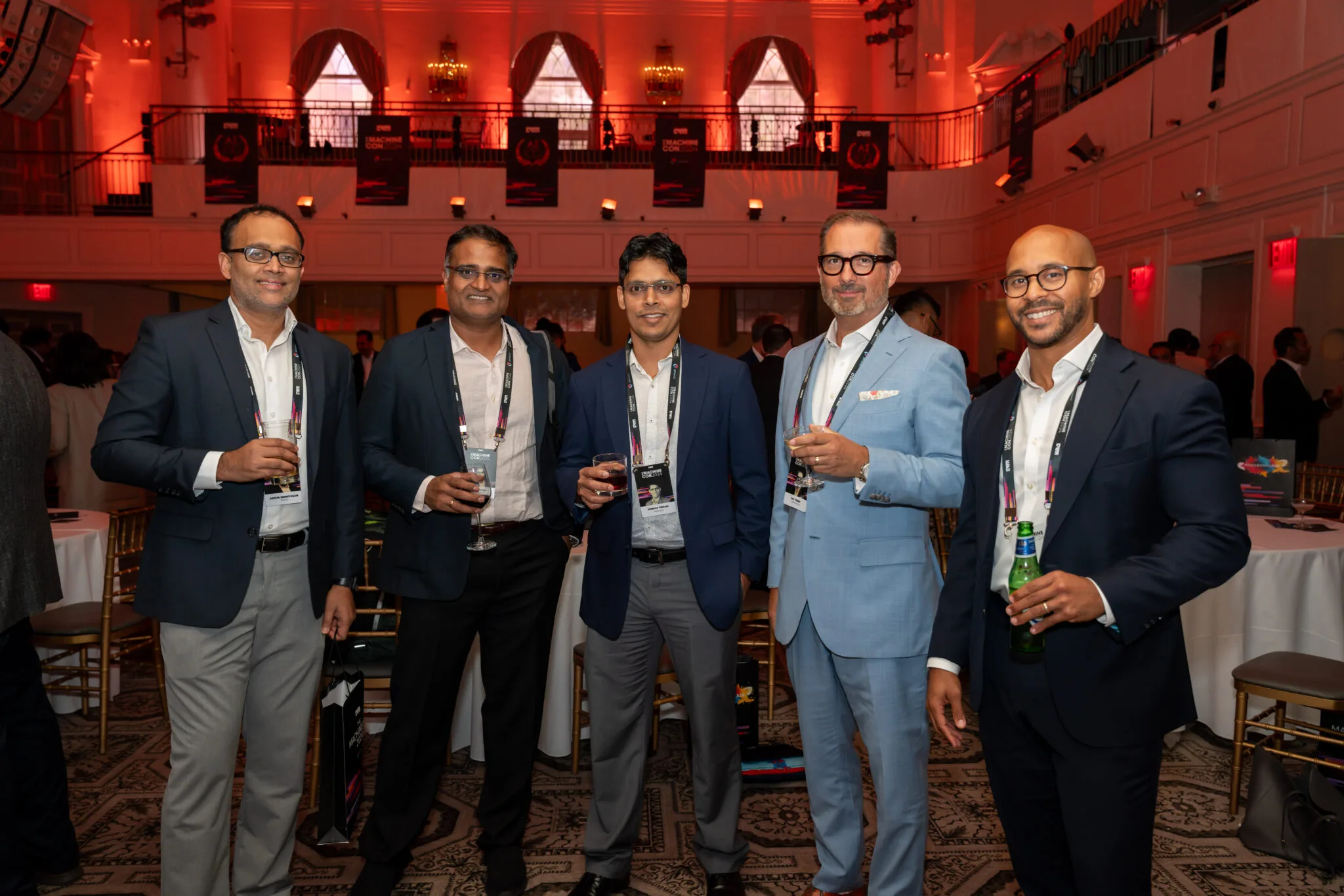 Group networking with drinks at MachineCon New York 2024