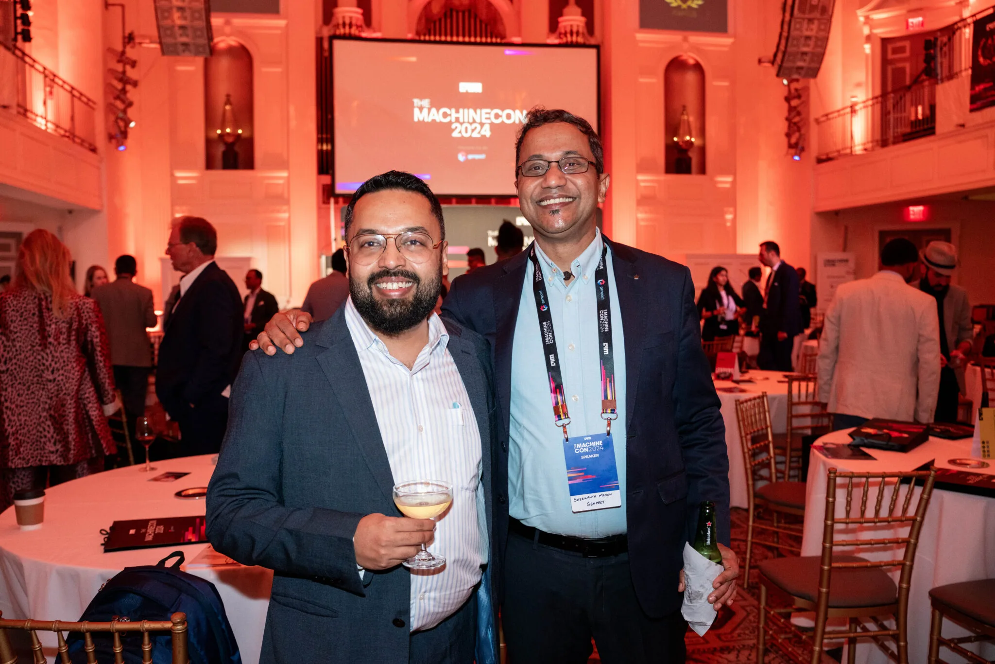 Attendees pose and chat at MachineCon New York 2024