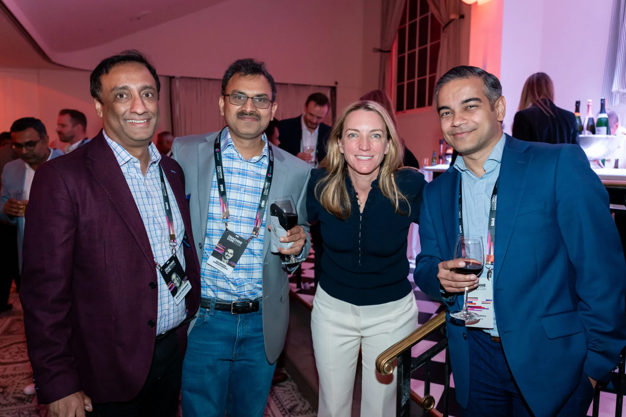 Attendees posing and networking at MachineCon New York 2024
