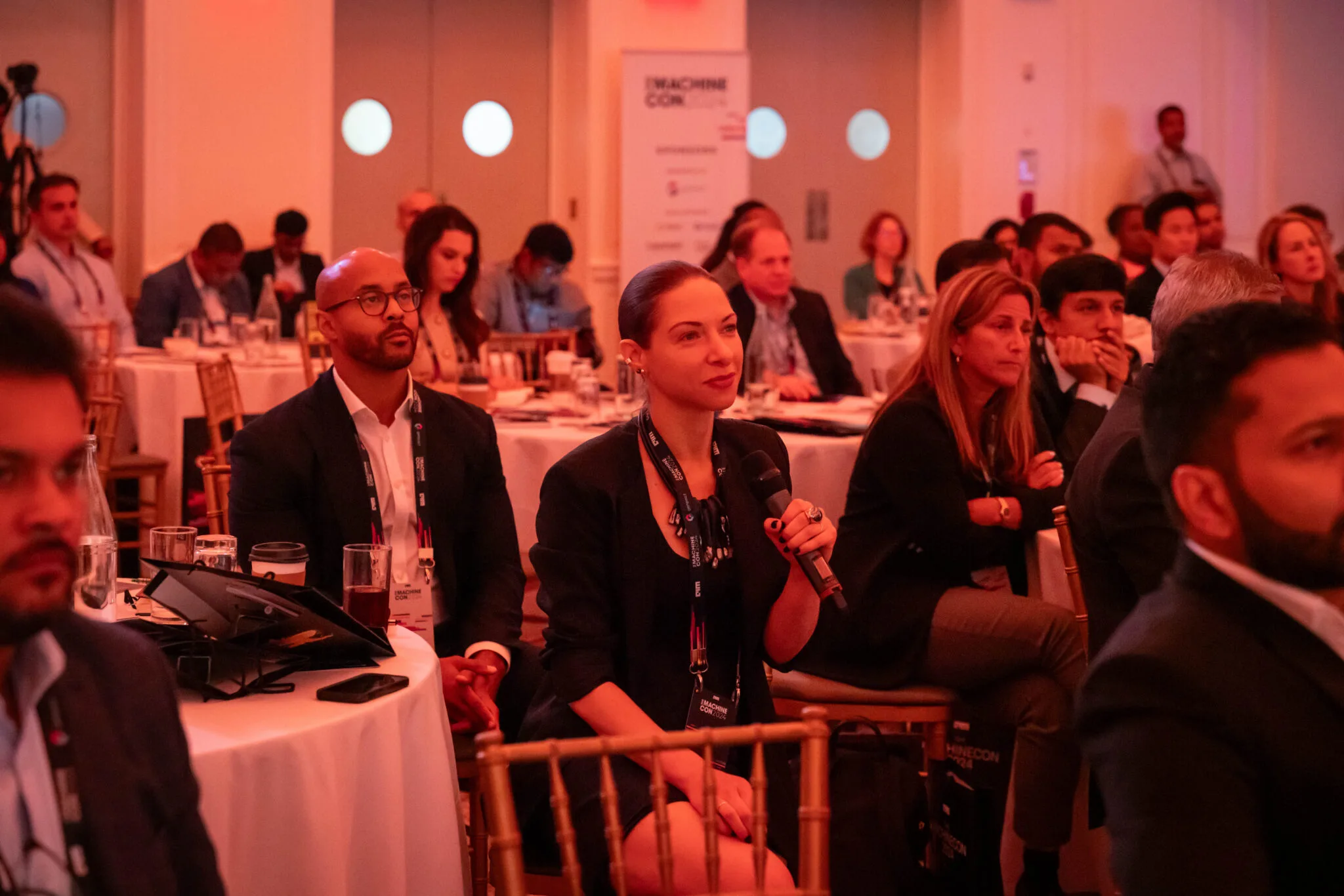 Engaged audience members listening at MachineCon New York 2024