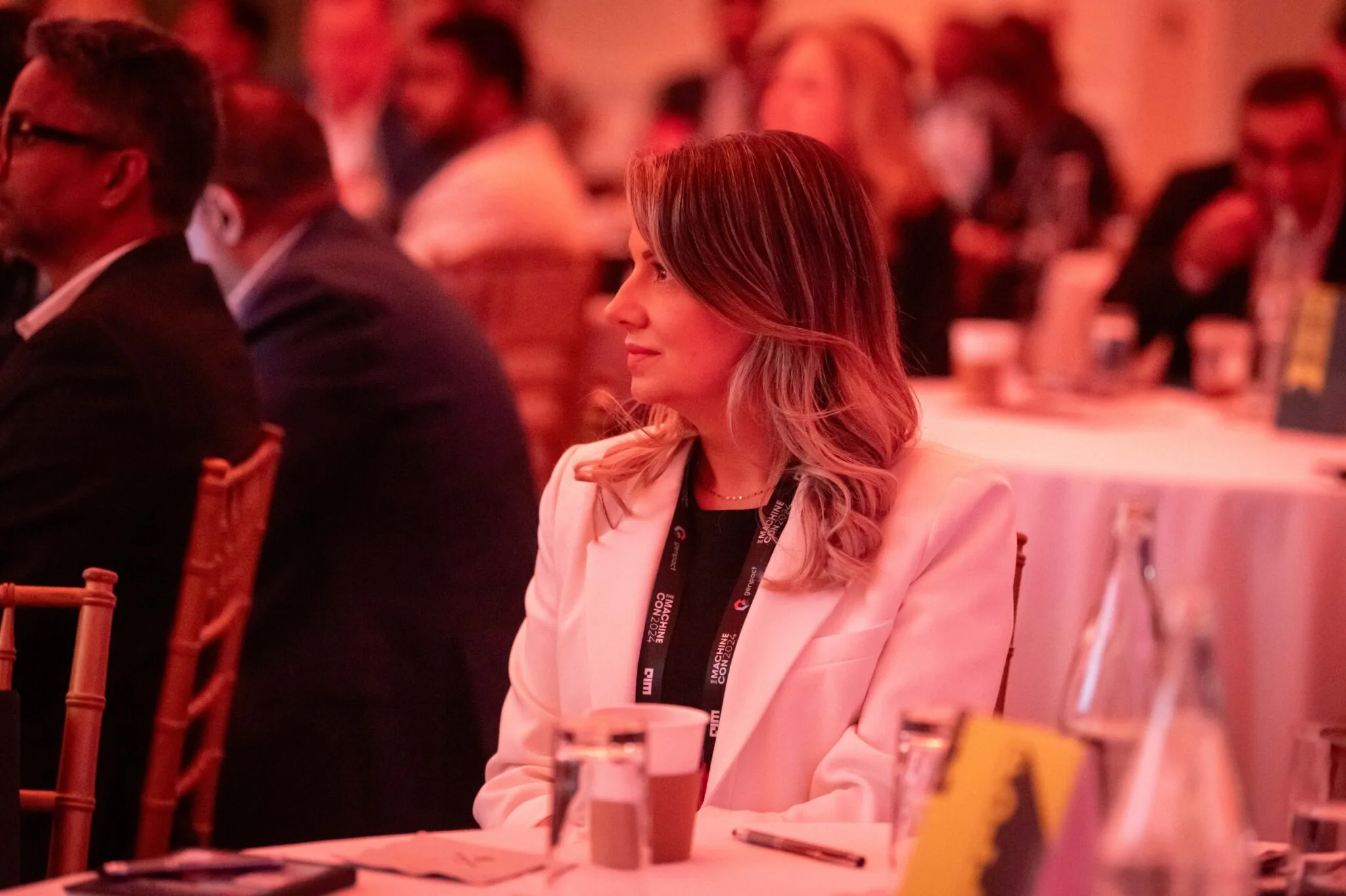 Attendee listening during session at MachineCon New York 2024