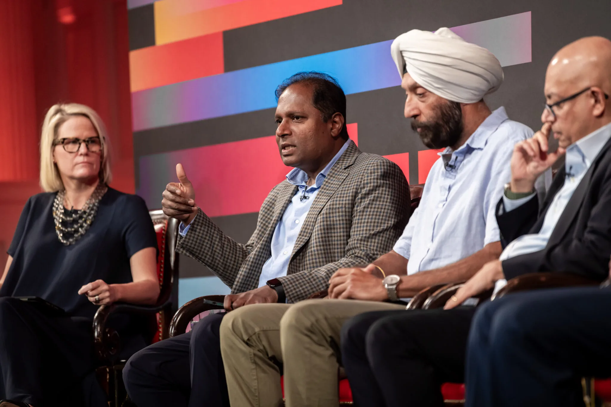 Panel discussion on stage at MachineCon New York 2024