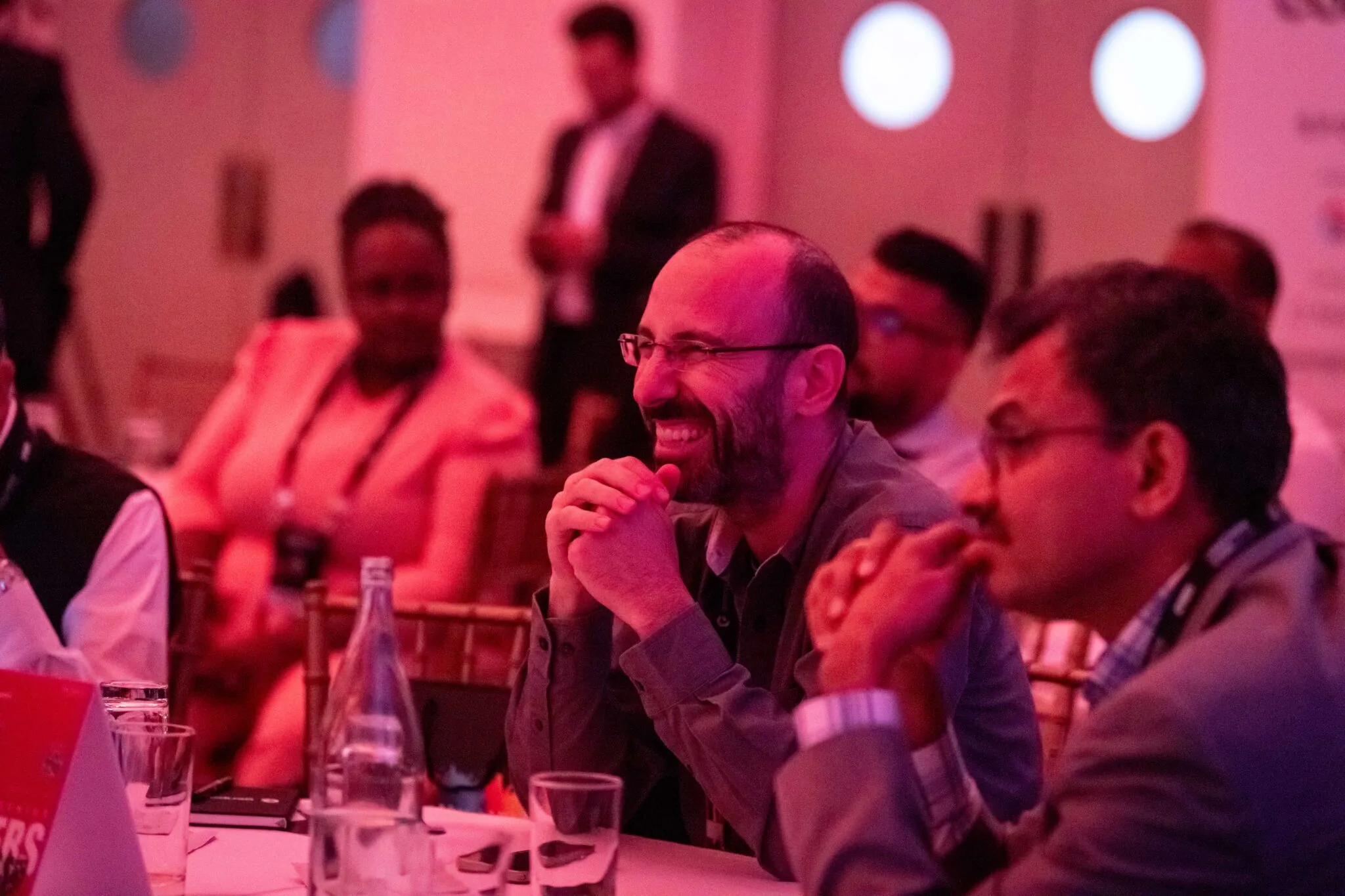 Attendees engaged in discussion at MachineCon New York 2024