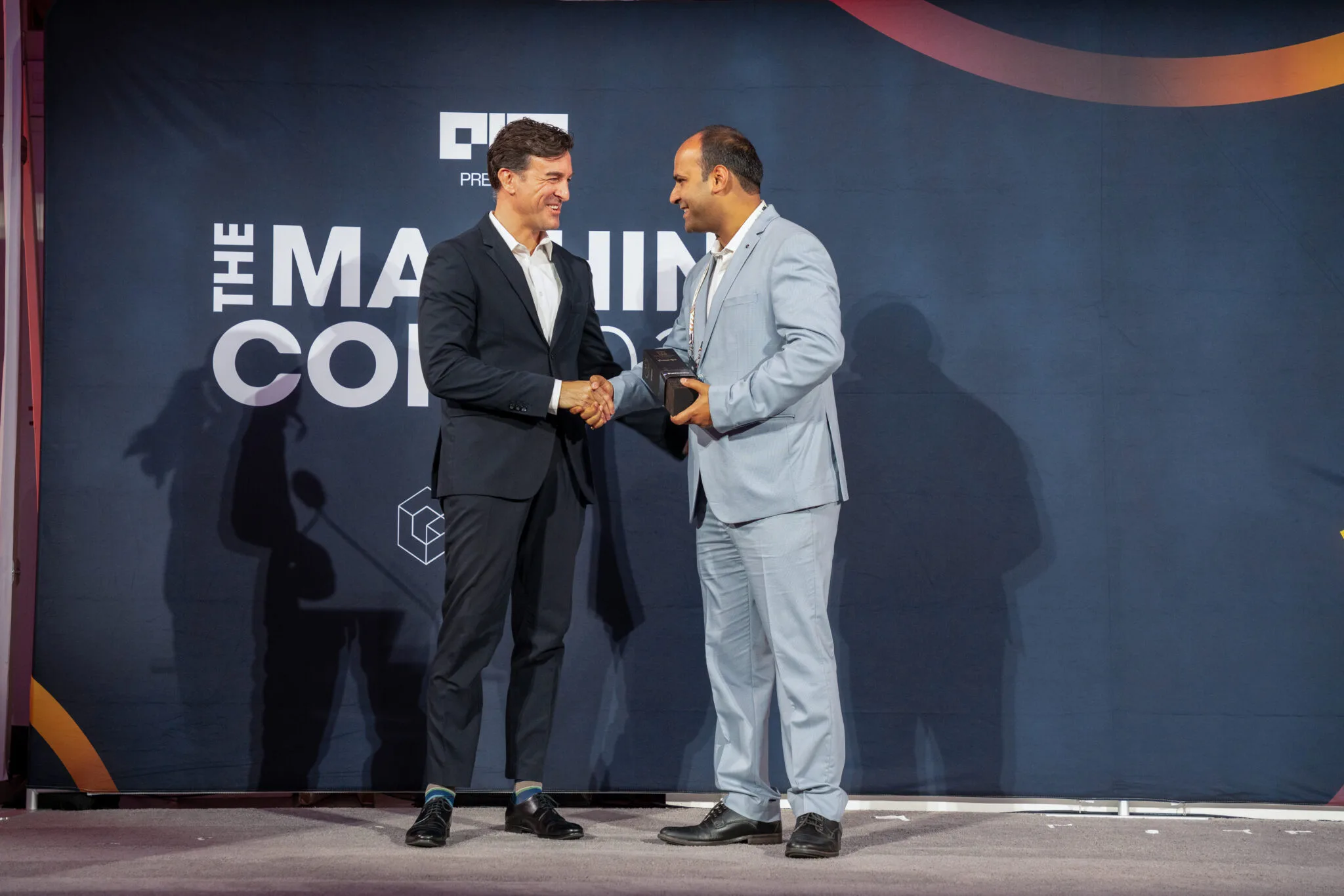 Award presentation on stage at MachineCon New York 2025