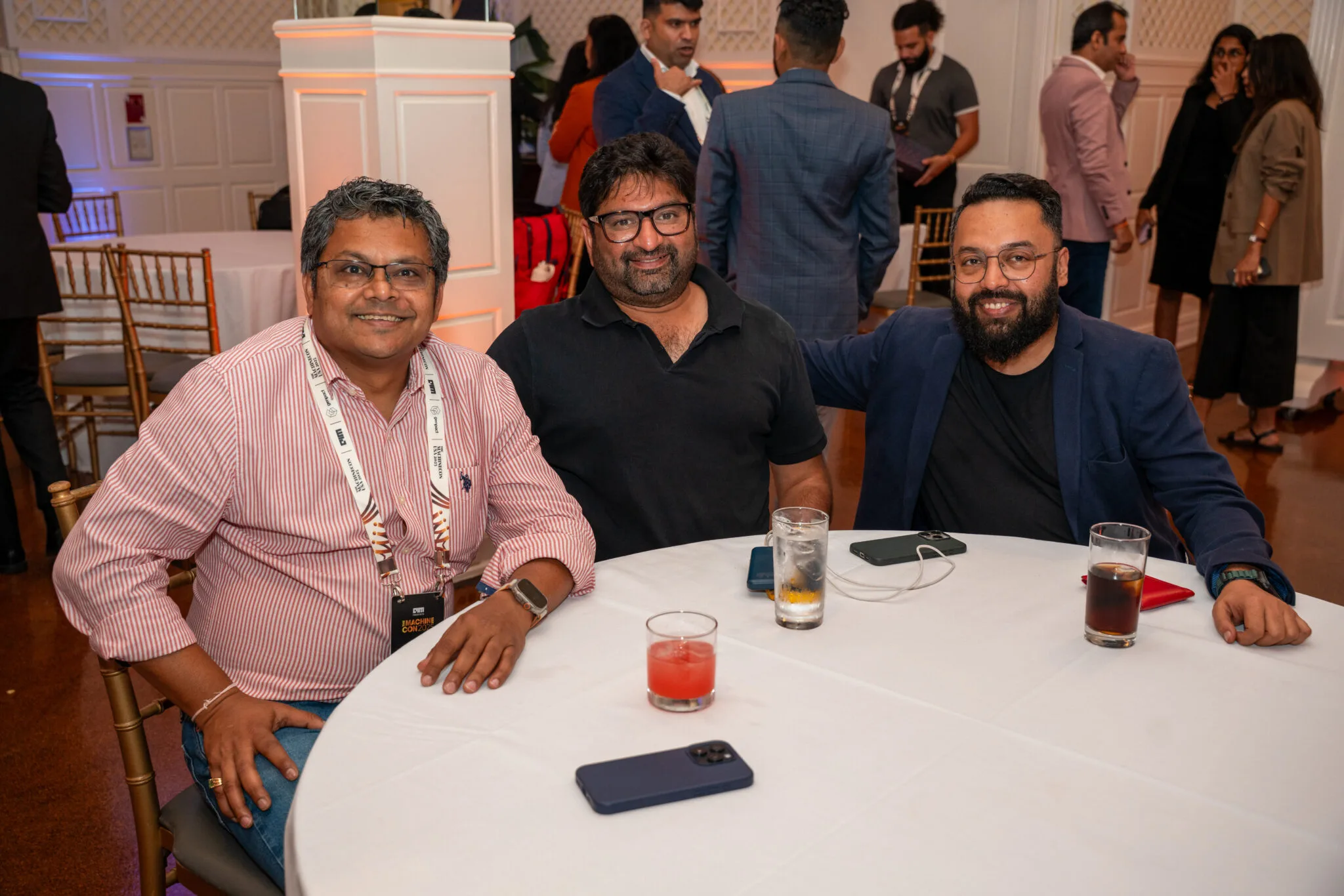 Group networking at round table at MachineCon New York 2025