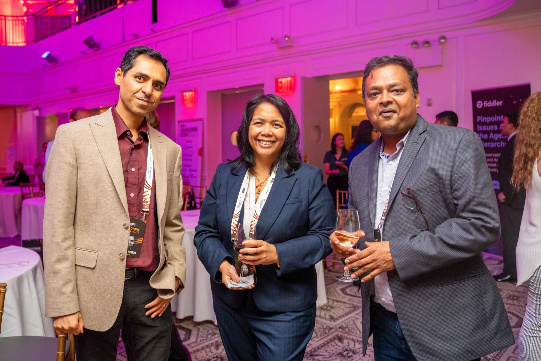 Attendees networking and smiling at MachineCon New York 2025