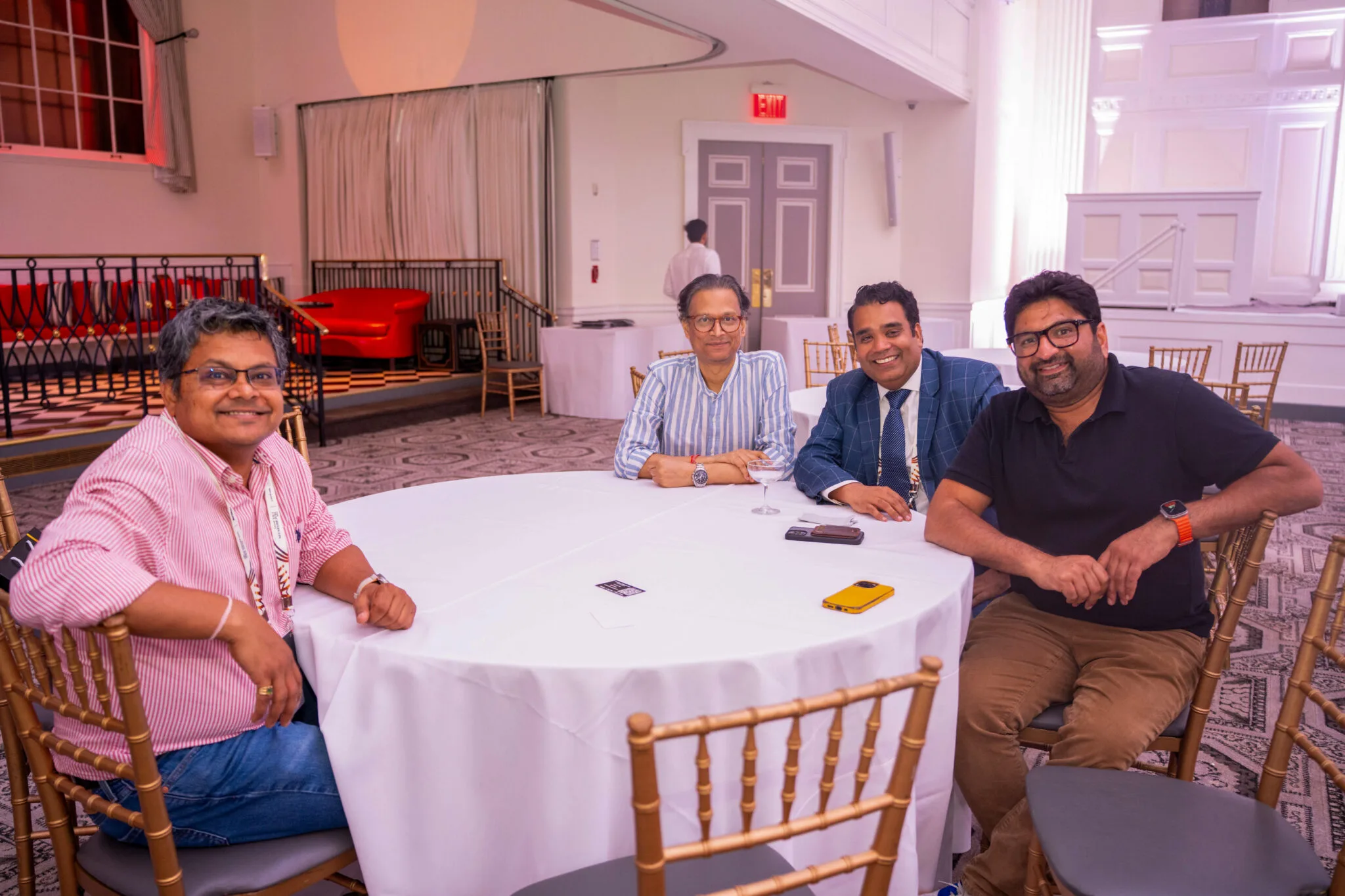 Four people seated around table at MachineCon New York 2025