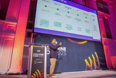 Speaker presenting on main stage · 2025