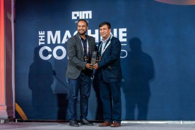 Award presentation on stage at MachineCon New York 2025