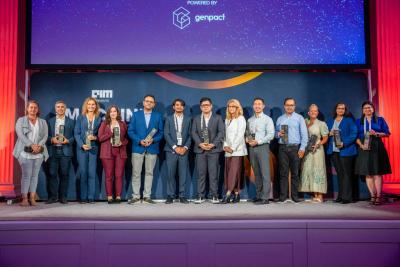 Award winners posing on stage · 2025